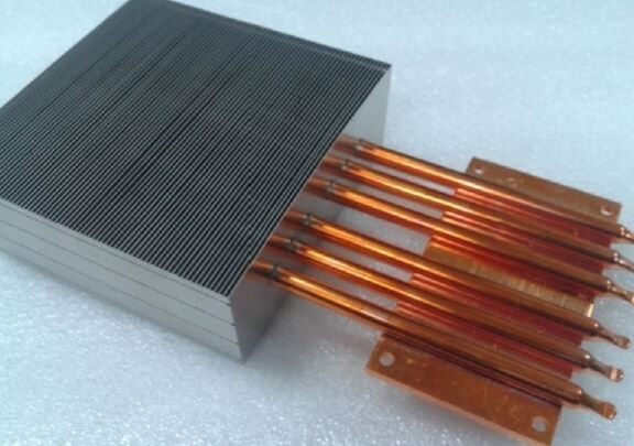 Custom aluminium heatsink with embedded copper heat pipes by P&A International