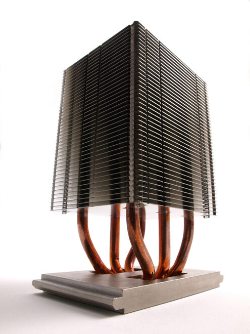 Custom copper heat pipes embedded in a finned tower heatsink assembly by P&A International