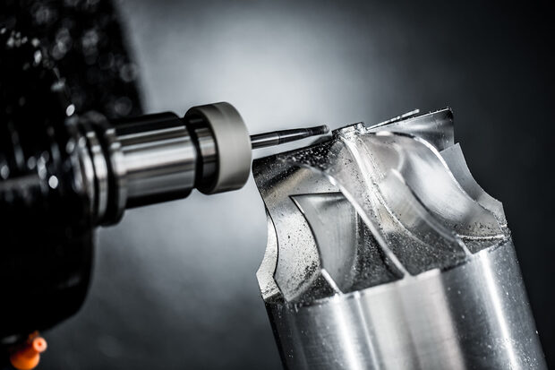 CNC machining and finishing of a die-cast part