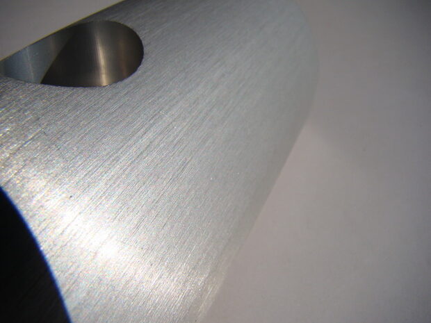 Machined and brushed aluminium extrusion